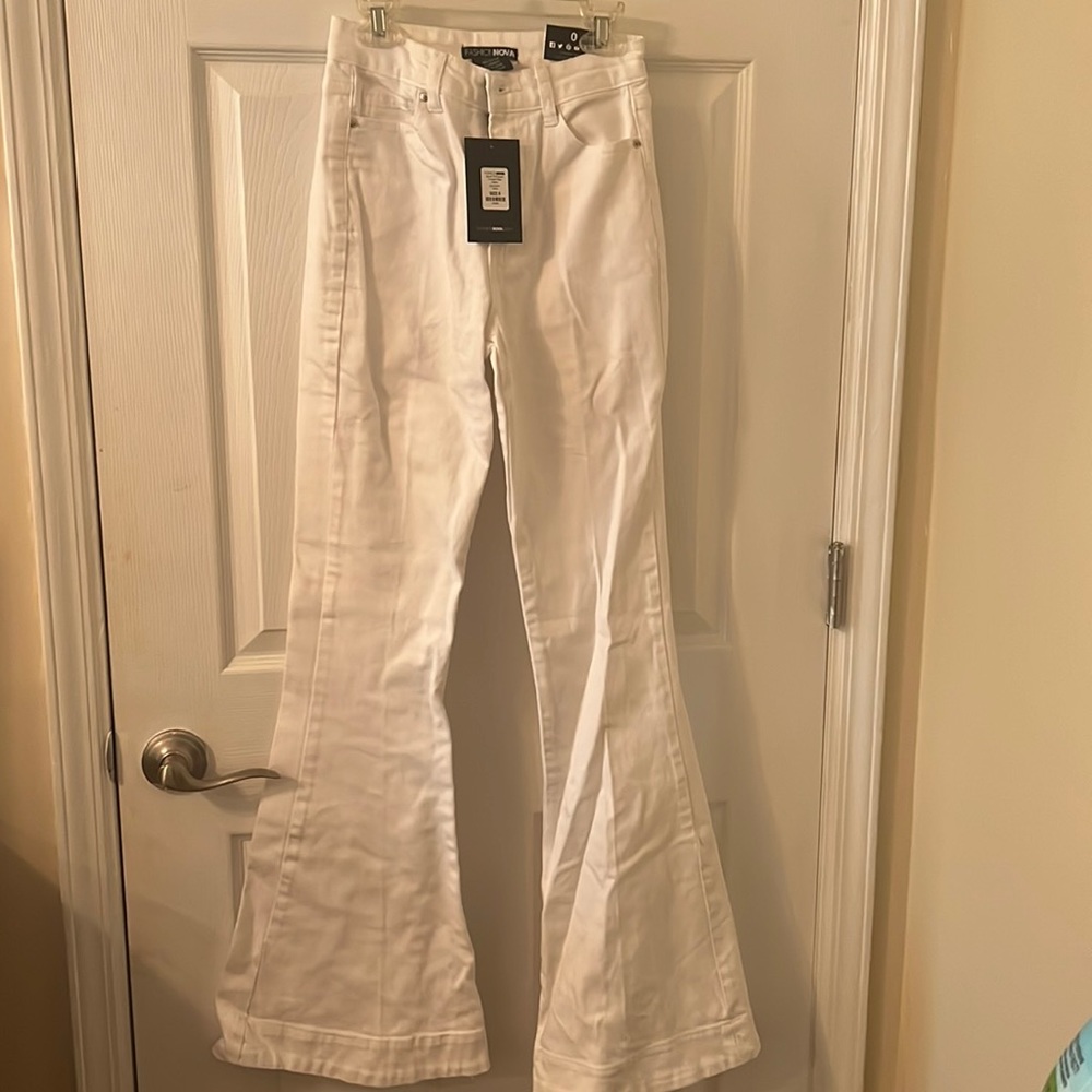 Never worn new with tags white high rise flared out jeans